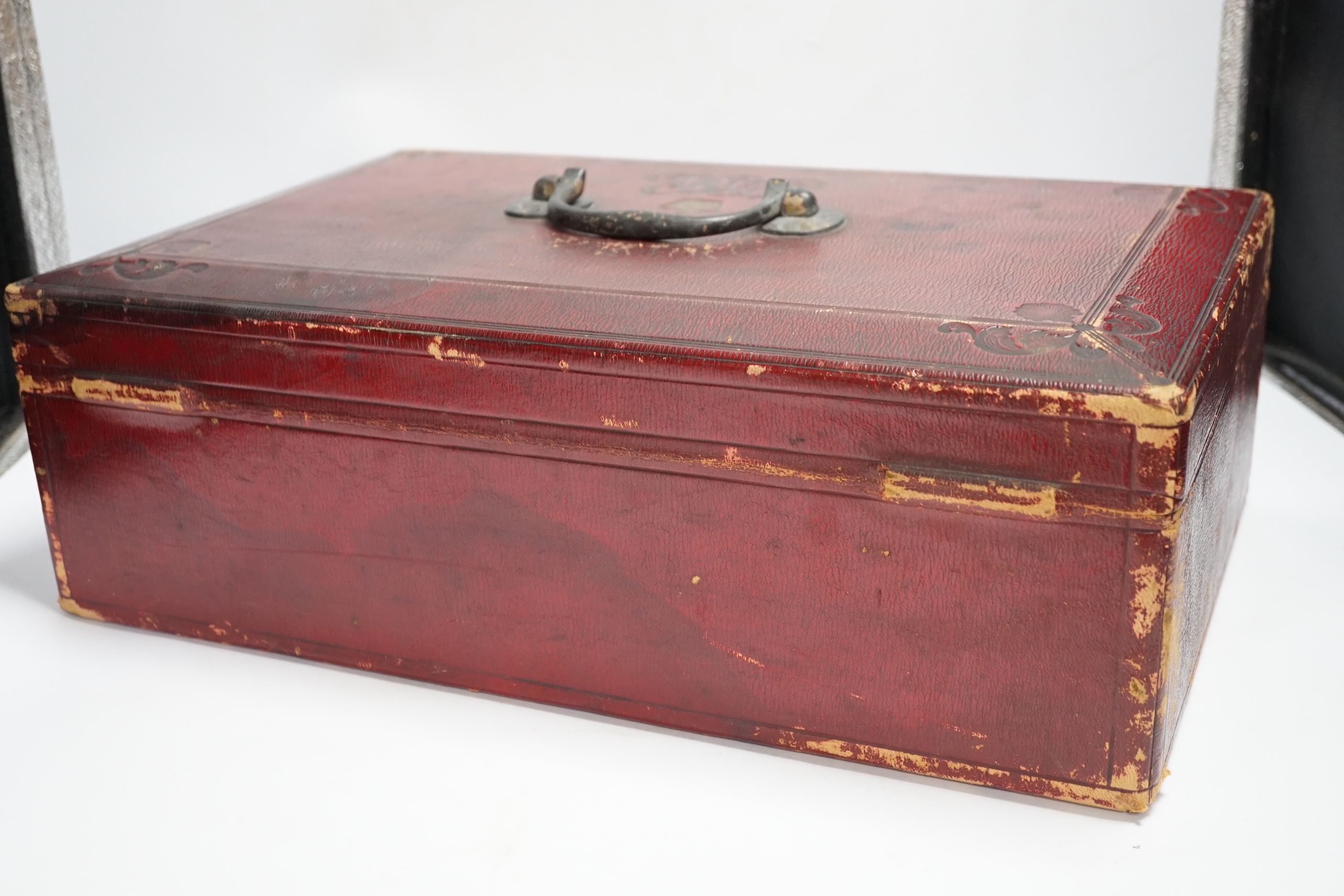 A Victorian red Morocco dispatch box (locked with no key)